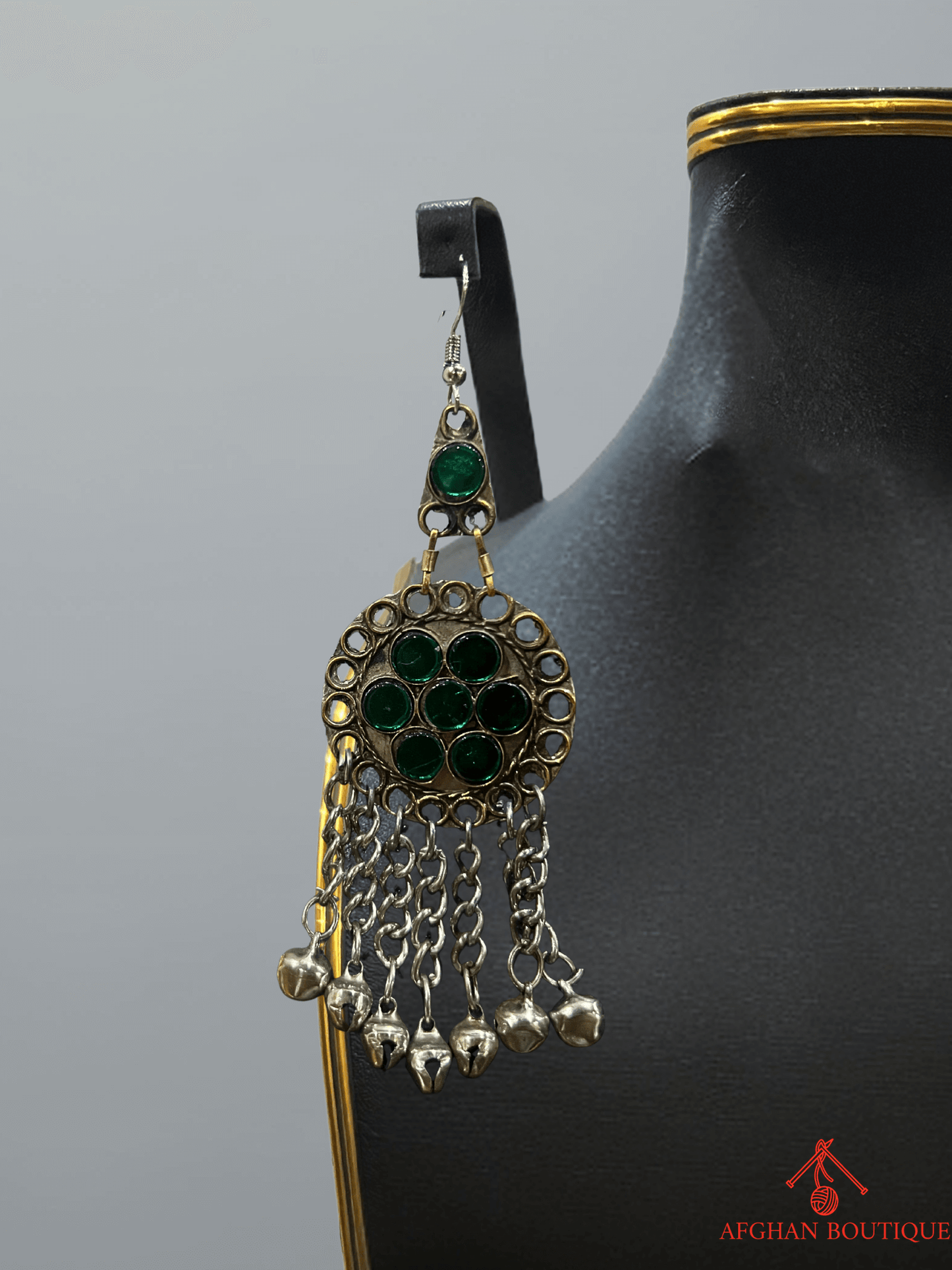 Right earring from emerald green handcrafted jewelry set with colorful tribal stones and ethnic handmade finish.