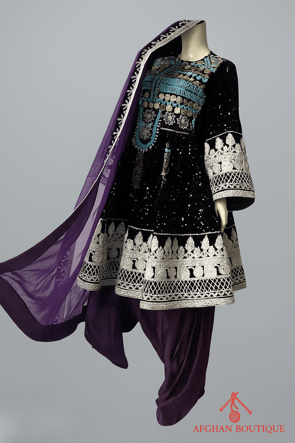 Left view of purple Afghani frock with intricate handcrafted embroidery