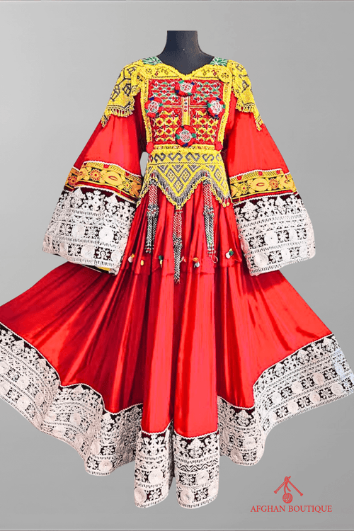 Bright red Afghani frock with yellow embroidery, front view
