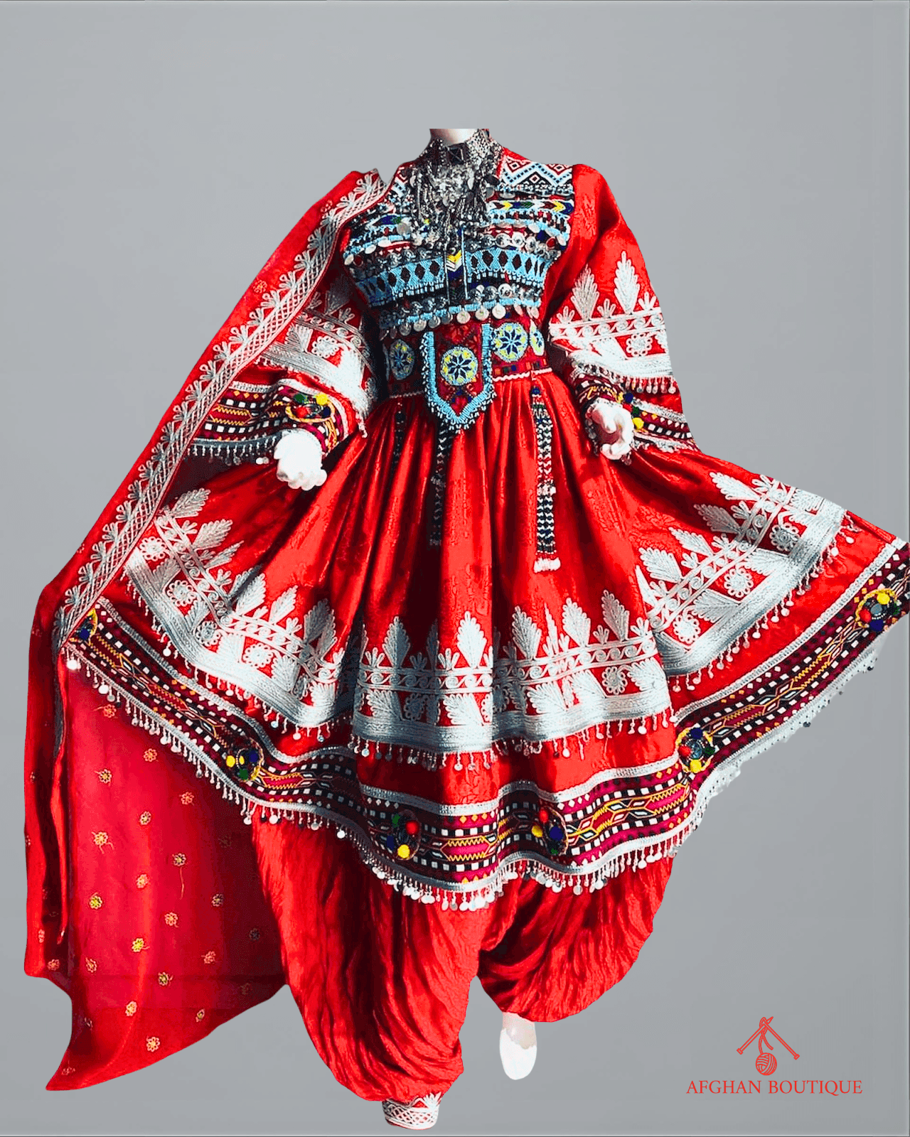 Front view of classic red Afghani frock with golden embroidery
