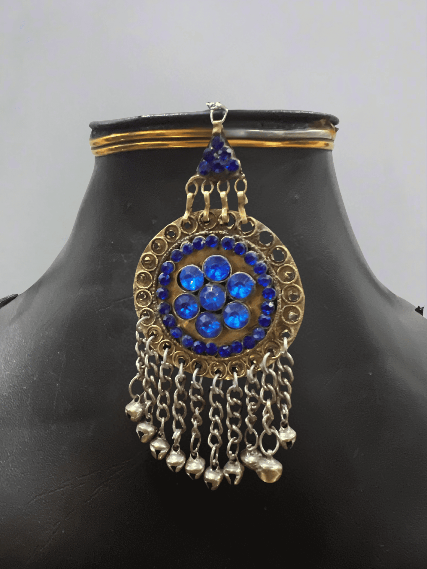 Dark blue handcrafted Afghani headpiece close-up