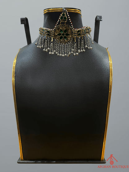 Emerald green handcrafted Afghani headpiece with traditional tribal design and fine handmade jewelry craftsmanship.