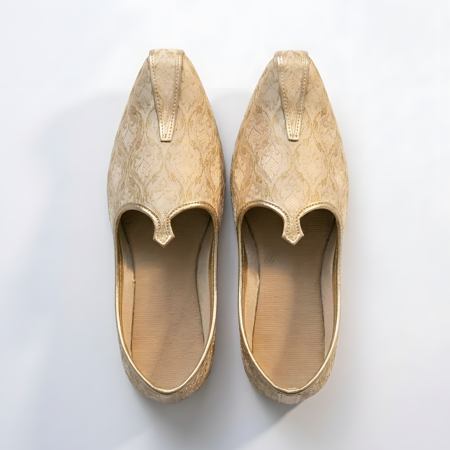 Gold embroidered khussa shoes pair top view traditional handmade Pakistani formal footwear