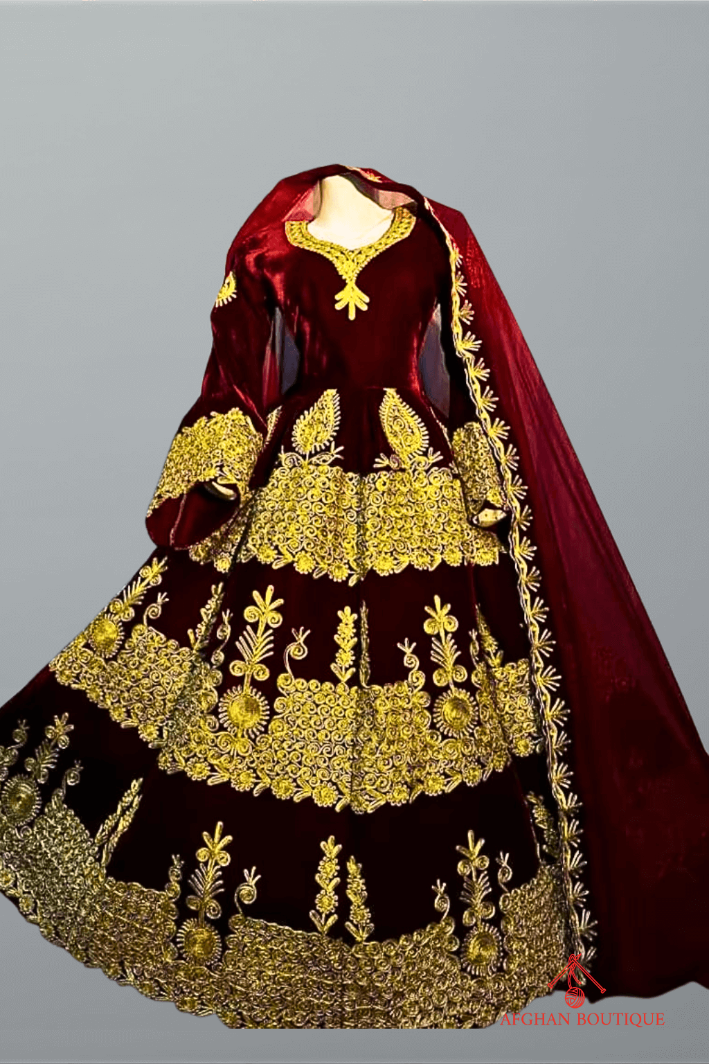 Front view of golden embroidered Afghani maxi with velvet touch
