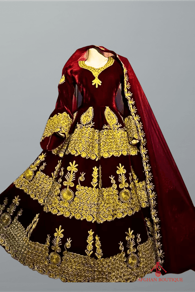 Front view of golden embroidered Afghani maxi with velvet touch
