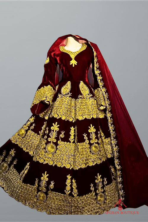 Front view of golden embroidered Afghani maxi with velvet touch
