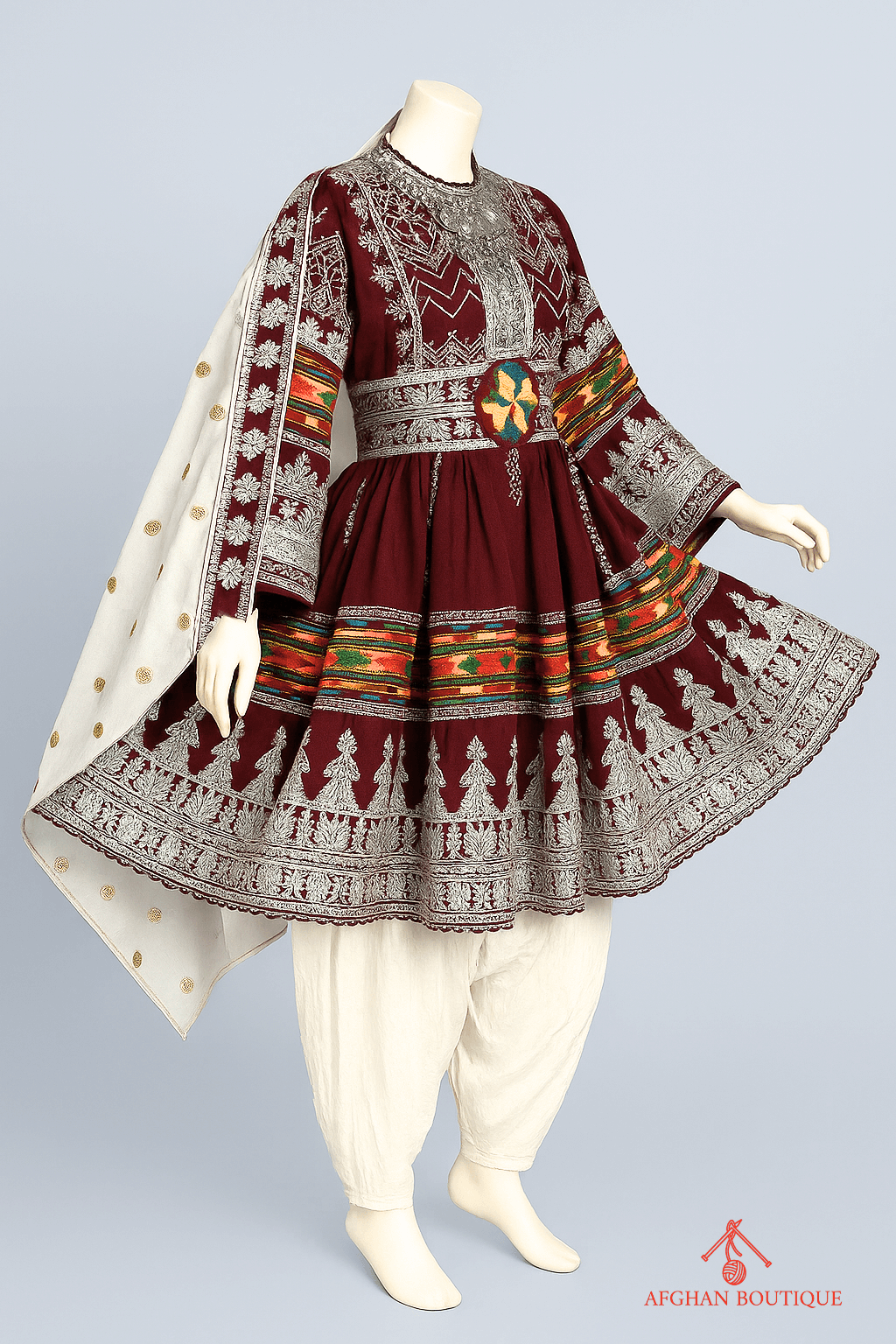 Right side of maroon Afghani frock showing traditional Afghani patterns

