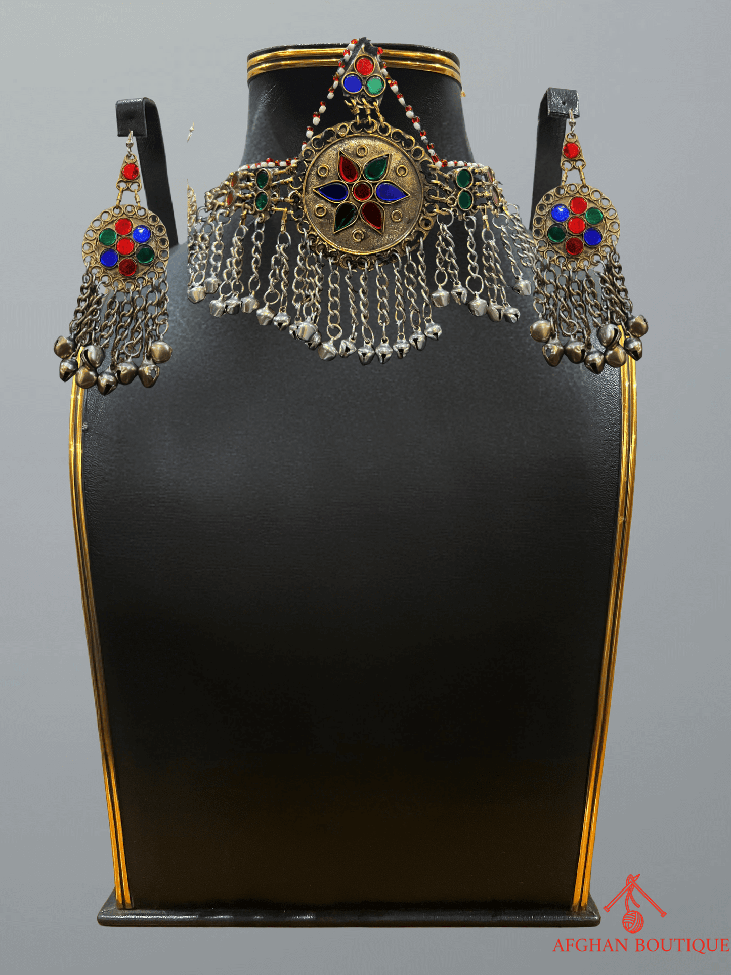 Handcrafted Afghani headpiece and earrings set with multicolour tribal stones, traditional ethnic jewelry craftsmanship.