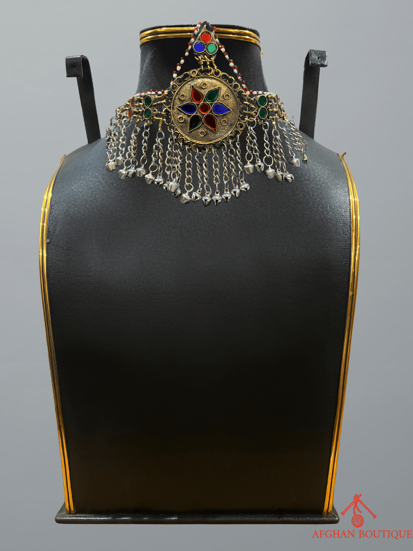 Multicolour handcrafted Afghani headpiece with detailed metalwork and tribal embellishments, part of traditional ethnic jewelry.