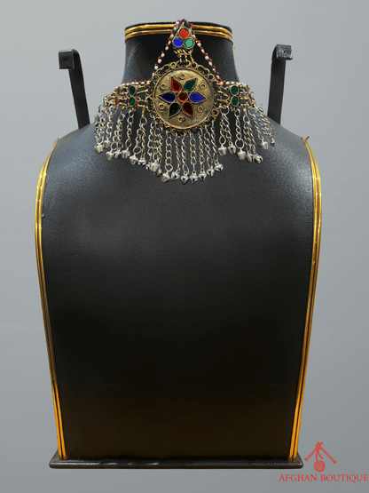 Multicolour handcrafted Afghani headpiece with detailed metalwork and tribal embellishments, part of traditional ethnic jewelry.