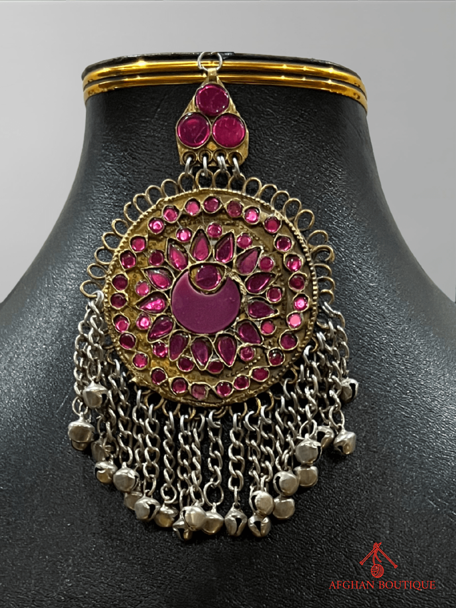 Pink handcrafted Afghani headpiece close-up