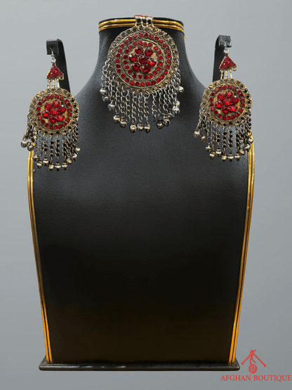Red Afghan jewelry headpiece with matching earrings — traditional design with detailed beadwork and ethnic charm.