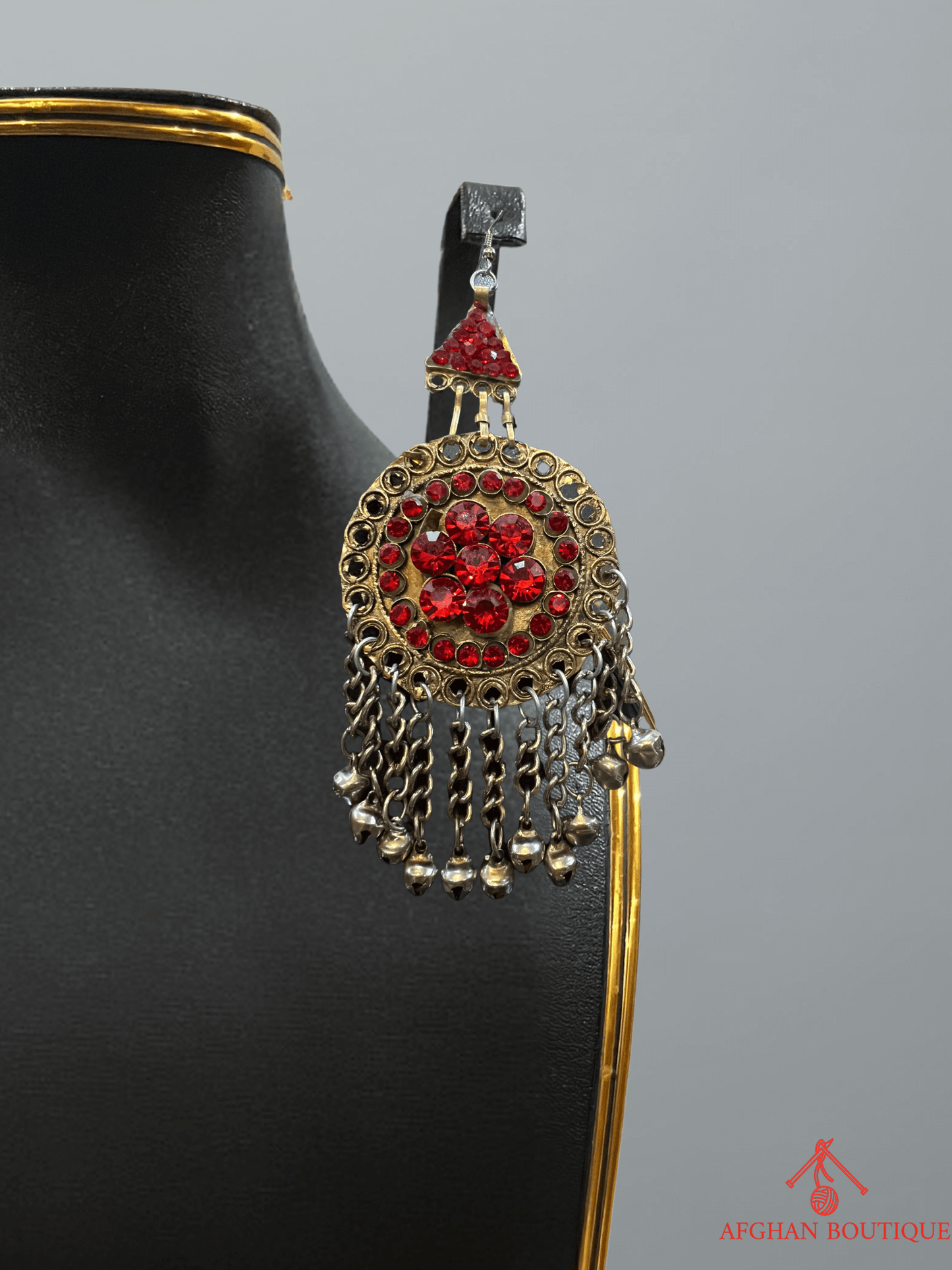 Left red Afghan earring — elegant handcrafted tribal jewelry piece with ethnic detailing.