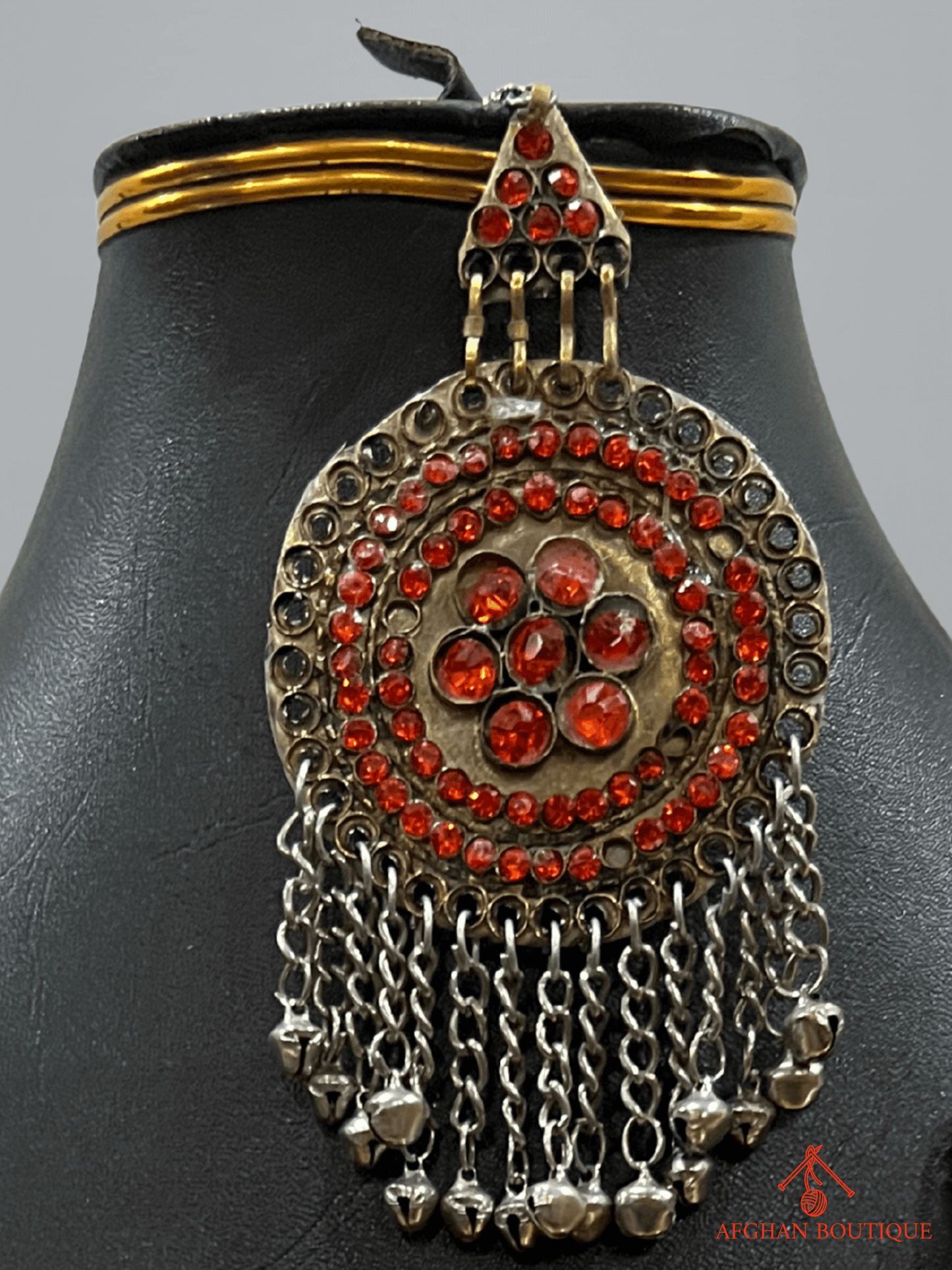 Sunset orange handcrafted Afghani headpiece close-up