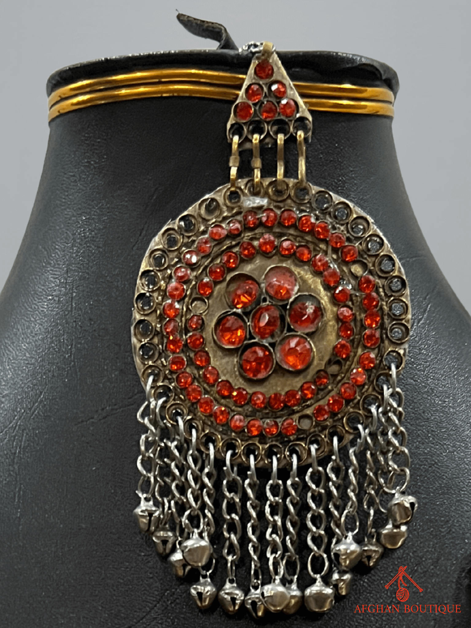 Sunset orange handcrafted Afghani headpiece close-up